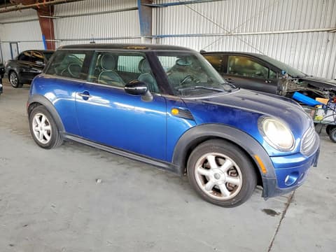 2009 Mini Cooper, VIN WMWMF33519TW70819. Фото 4 з 6 з аукціону Copart. Каталог авто зі США OpenDataCar.