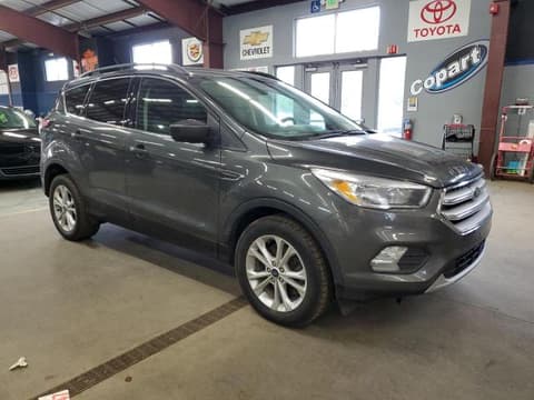 2018 Ford Escape, VIN 1FMCU9GDXJUC11551. Фото 4 из 6 с аукциона Copart. Каталог авто из США OpenDataCar.