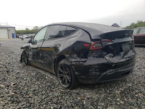 2025 Tesla Model Y, VIN 7SAYGAEE9SF233987. Фото 2 из 6 с аукциона Copart. Каталог авто из США OpenDataCar.