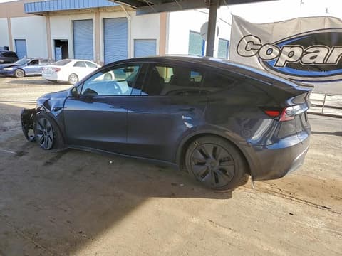 2025 Tesla Model Y, VIN 7SAYGAEE1SF279426. Фото 2 з 6 з аукціону Copart. Каталог авто зі США OpenDataCar.