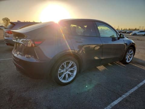 2023 Tesla Model Y, VIN 7SAYGAEE9PF861071. Фото 3 з 6 з аукціону Copart. Каталог авто зі США OpenDataCar.