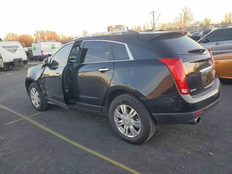 2015 Cadillac SRX, VIN 3GYFNBE3XFS557844. Zdjęcie 2 z 6 z aukcji Copart. Katalog aut z USA OpenDataCar.