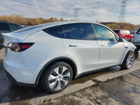 2023 Tesla Model Y, VIN 7SAYGAEE3PF591383. Фото 3 з 6 з аукціону Copart. Каталог авто зі США OpenDataCar.
