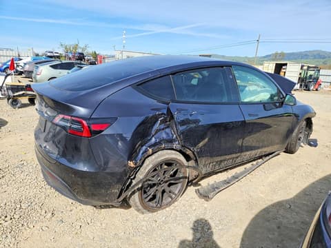 2025 Tesla Model Y, VIN 7SAYGDED8SF262924. Фото 3 з 6 з аукціону Copart. Каталог авто зі США OpenDataCar.