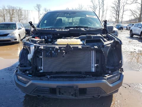 2023 Ford F-150 Lightning, VIN 1FTEW1EP0PKF92644. Фото 5 з 6 з аукціону Copart. Каталог авто зі США OpenDataCar.