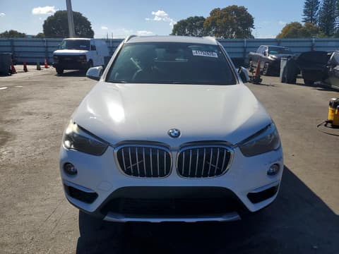 2018 Bmw X1, VIN WBXHU7C3XJ3F04390. Photo 5 of 6 from Copart auction. OpenDataCar US salvage catalog.