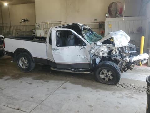 2002 Ford F-150 Lightning, VIN 2FTRX18L12CA10071. Фото 4 з 6 з аукціону Copart. Каталог авто зі США OpenDataCar.