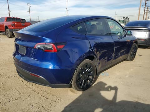 2023 Tesla Model Y, VIN 7SAYGAEE2PF666848. Фото 3 з 6 з аукціону Copart. Каталог авто зі США OpenDataCar.