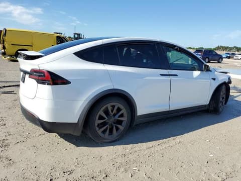2023 Tesla Model X, VIN 7SAXCAE51PF384515. Фото 3 из 6 с аукциона Copart. Каталог авто из США OpenDataCar.