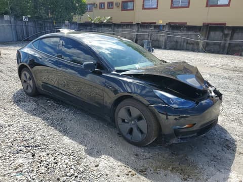 2023 Tesla Model 3, VIN 5YJ3E1EA5PF569301. Фото 4 з 6 з аукціону Copart. Каталог авто зі США OpenDataCar.