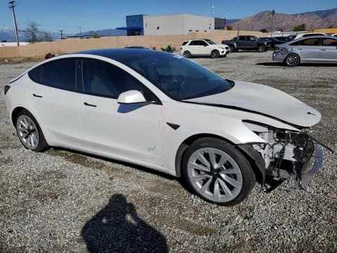 2021 Tesla Model 3, VIN 5YJ3E1EB4MF015669. Фото 4 з 6 з аукціону Copart. Каталог авто зі США OpenDataCar.