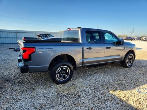 2022 Ford F-150 Lightning, VIN 1FT6W1EV7NWG12462. Фото 3 з 6 з аукціону Copart. Каталог авто зі США OpenDataCar.