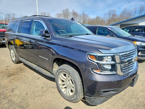 2017 Chevrolet Suburban, VIN 1GNSKHKCXHR181521. Photo 4 of 6 from Copart auction. OpenDataCar US salvage catalog.