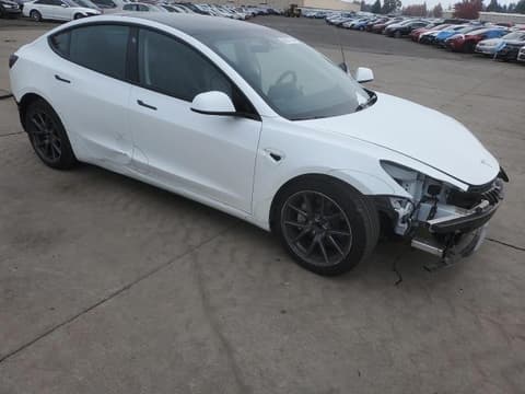 2023 Tesla Model 3, VIN 5YJ3E1EA3PF612436. Фото 4 з 6 з аукціону Copart. Каталог авто зі США OpenDataCar.