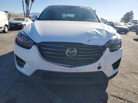2016 Mazda CX-5, VIN JM3KE2DY4G0701714. Фото 5 з 6 з аукціону Copart. Каталог авто зі США OpenDataCar.