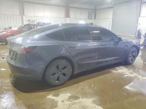 2023 Tesla Model 3, VIN 5YJ3E1EB9PF636426. Фото 3 з 6 з аукціону Copart. Каталог авто зі США OpenDataCar.