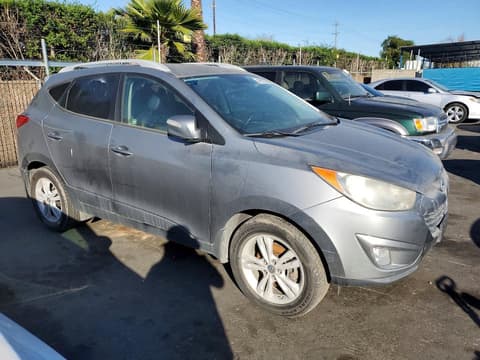 2013 Hyundai Tucson, VIN KM8JU3AC8DU769097. Фото 4 из 6 с аукциона Copart. Каталог авто из США OpenDataCar.