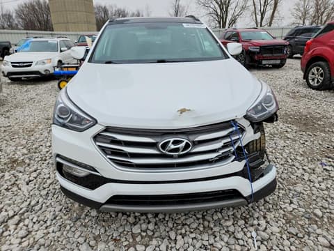 2018 Hyundai Santa Fe, VIN 5NMZWDLAXJH097923. Photo 5 of 6 from Copart auction. OpenDataCar US salvage catalog.