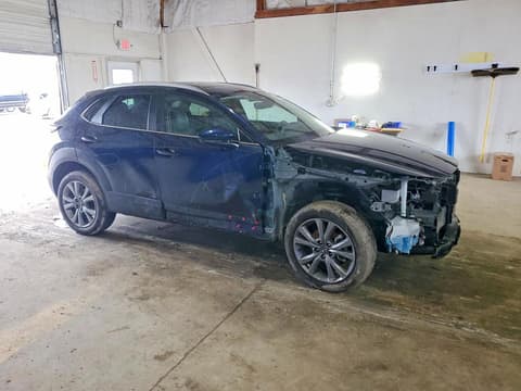 2024 Mazda CX-30, VIN 3MVDMBCM8RM704178. Photo 4 of 6 from Copart auction. OpenDataCar US salvage catalog.