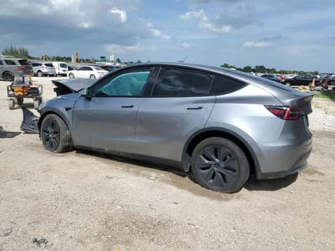 2025 Tesla Model Y, VIN 7SAYGDEE7SA348733. Фото 2 з 6 з аукціону Copart. Каталог авто зі США OpenDataCar.