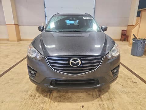 2016 Mazda CX-5, VIN JM3KE4CY5G0715182. Photo 5 of 6 from Copart auction. OpenDataCar US salvage catalog.