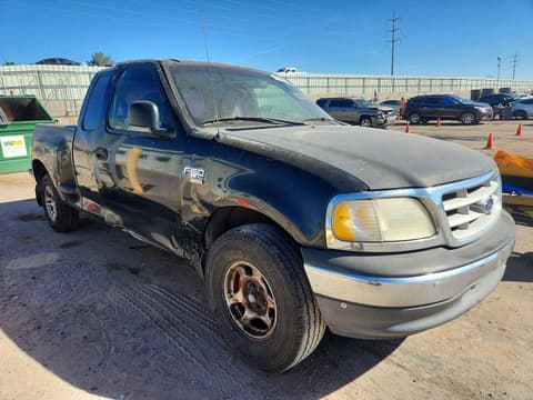 1999 Ford F-150 Lightning, VIN 1FTRX07W0XKB62786. Фото 4 з 6 з аукціону Copart. Каталог авто зі США OpenDataCar.