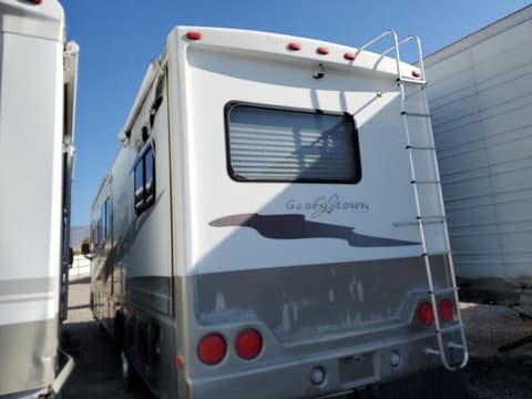 2006 Ford , VIN 1F6NF53Y560A15303. Zdjęcie 3 z 6 z aukcji Copart. Katalog aut z USA OpenDataCar.