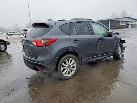 2014 Mazda CX-5, VIN JM3KE4DY5E0349770. Фото 3 з 6 з аукціону Copart. Каталог авто зі США OpenDataCar.