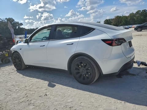 2023 Tesla Model Y, VIN 7SAYGAEE8PF697036. Фото 2 з 6 з аукціону Copart. Каталог авто зі США OpenDataCar.