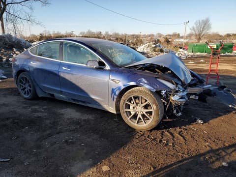 2019 Tesla Model 3, VIN 5YJ3E1EB9KF199536. Фото 4 з 6 з аукціону Copart. Каталог авто зі США OpenDataCar.