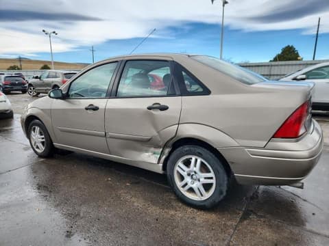 2004 Ford Focus, VIN 1FAFP38ZX4W149793. Фото 2 из 6 с аукциона Copart. Каталог авто из США OpenDataCar.