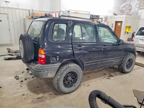 2000 Chevrolet Tracker, VIN 2CNBJ13C8Y6917803. Zdjęcie 3 z 6 z aukcji Copart. Katalog aut z USA OpenDataCar.
