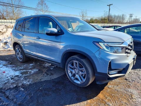 2023 Honda Passport, VIN 5FNYF8H5XPB034975. Фото 4 з 6 з аукціону Copart. Каталог авто зі США OpenDataCar.