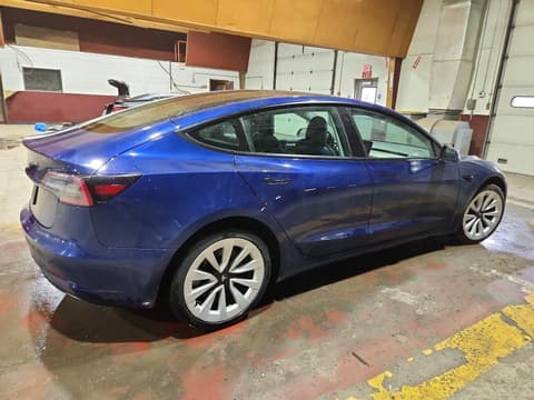 2023 Tesla Model 3, VIN 5YJ3E1EA8PF451999. Фото 3 з 6 з аукціону Copart. Каталог авто зі США OpenDataCar.
