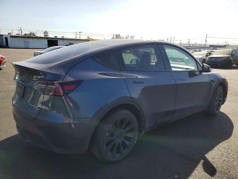 2023 Tesla Model Y, VIN 7SAYGAEE3PF945466. Фото 3 з 6 з аукціону Copart. Каталог авто зі США OpenDataCar.