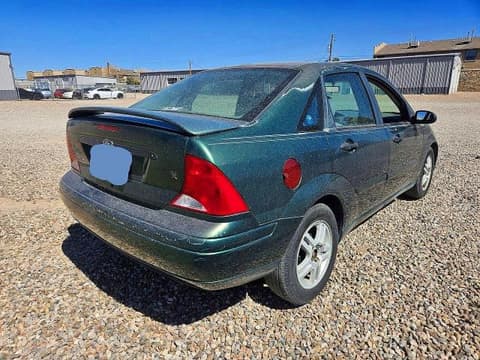 2000 Ford Focus, VIN 1FAFP3433YW219500. Фото 4 из 6 с аукциона Copart. Каталог авто из США OpenDataCar.