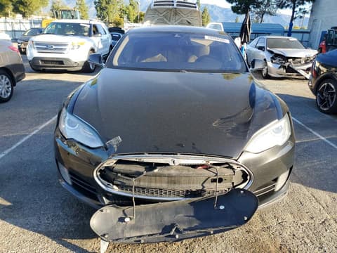2015 Tesla Model S, VIN 5YJSA1S21FF084995. Фото 5 з 6 з аукціону Copart. Каталог авто зі США OpenDataCar.