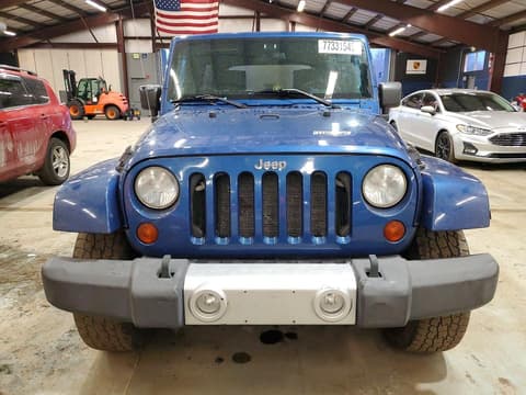 2010 Jeep Wrangler Unlimited, VIN 1J4BA5H12AL140495. Photo 5 of 6 from Copart auction. OpenDataCar US salvage catalog.