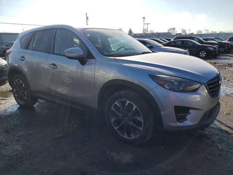 2016 Mazda CX-5, VIN JM3KE4DY7G0703338. Фото 4 з 6 з аукціону Copart. Каталог авто зі США OpenDataCar.