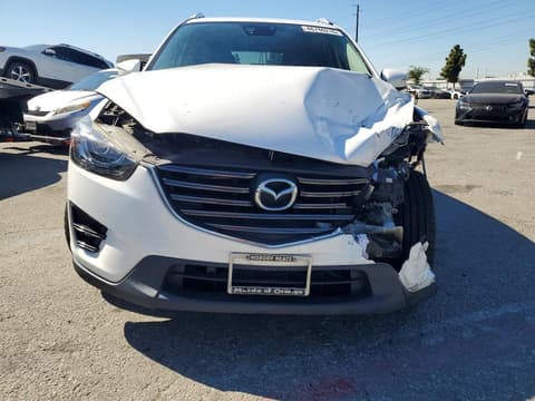 2016 Mazda CX-5, VIN JM3KE4DY4G0620871. Фото 5 з 6 з аукціону Copart. Каталог авто зі США OpenDataCar.