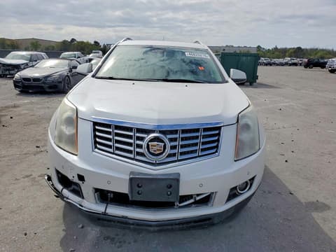 2016 Cadillac SRX, VIN 3GYFNCE39GS555929. Фото 5 из 6 с аукциона Copart. Каталог авто из США OpenDataCar.