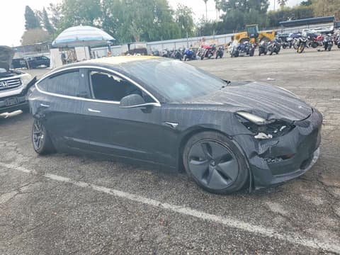 2018 Tesla Model 3, VIN 5YJ3E1EB2JF112476. Фото 4 з 6 з аукціону Copart. Каталог авто зі США OpenDataCar.
