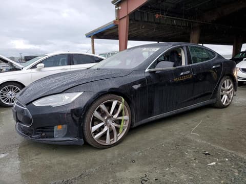 2015 Tesla Model S, VIN 5YJSA1E26FF119784. Фото 1 з 6 з аукціону Copart. Каталог авто зі США OpenDataCar.