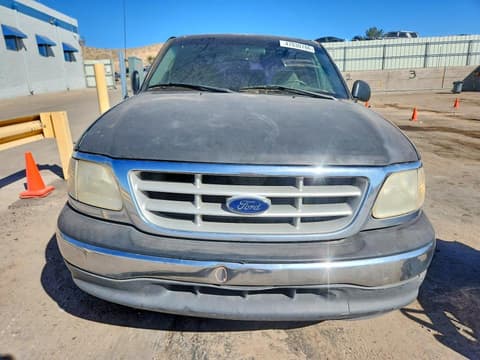 1999 Ford F-150 Lightning, VIN 1FTRX07W0XKB62786. Фото 5 з 6 з аукціону Copart. Каталог авто зі США OpenDataCar.