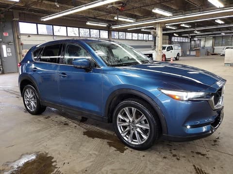 2021 Mazda CX-5, VIN JM3KFADM3M0327824. Фото 4 з 6 з аукціону Copart. Каталог авто зі США OpenDataCar.