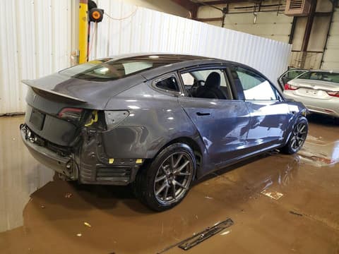 2023 Tesla Model 3, VIN 5YJ3E1EA9PF569639. Фото 3 з 6 з аукціону Copart. Каталог авто зі США OpenDataCar.