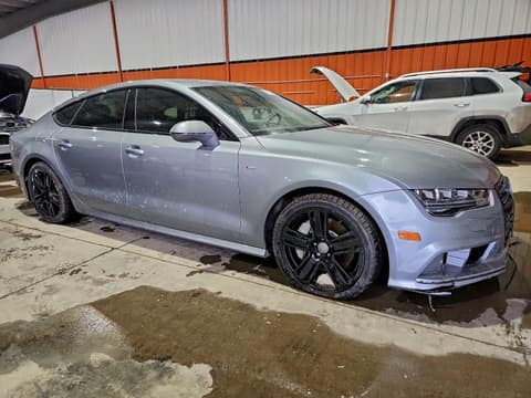 2016 Audi A7 Quattro, VIN WAU3GAFC9GN018037. Фото 4 з 6 з аукціону Copart. Каталог авто зі США OpenDataCar.