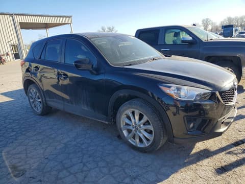2014 Mazda CX-5, VIN JM3KE4DY5E0323895. Фото 4 з 6 з аукціону Copart. Каталог авто зі США OpenDataCar.
