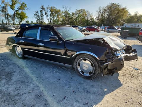 2001 Lincoln Town Car, VIN 1LNHM82W31Y658966. Фото 4 з 6 з аукціону Copart. Каталог авто зі США OpenDataCar.