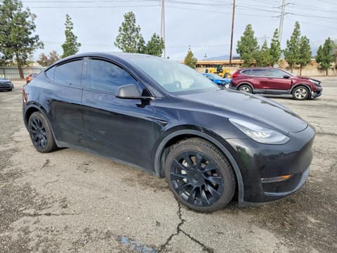 2023 Tesla Model Y, VIN 7SAYGDEE2PA082674. Фото 4 з 6 з аукціону Copart. Каталог авто зі США OpenDataCar.